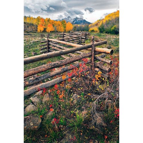 A log fence leads to the horizon on Dallas divide near Telluride in the Colorado Rocky Mountains